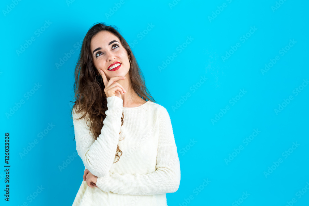 Young woman in a thoughtful pose Young woman in a thoughtful pose