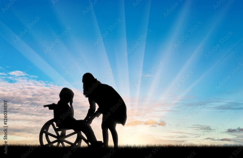 Fototapeta premium Disabled child in wheelchair crying and his mother day
