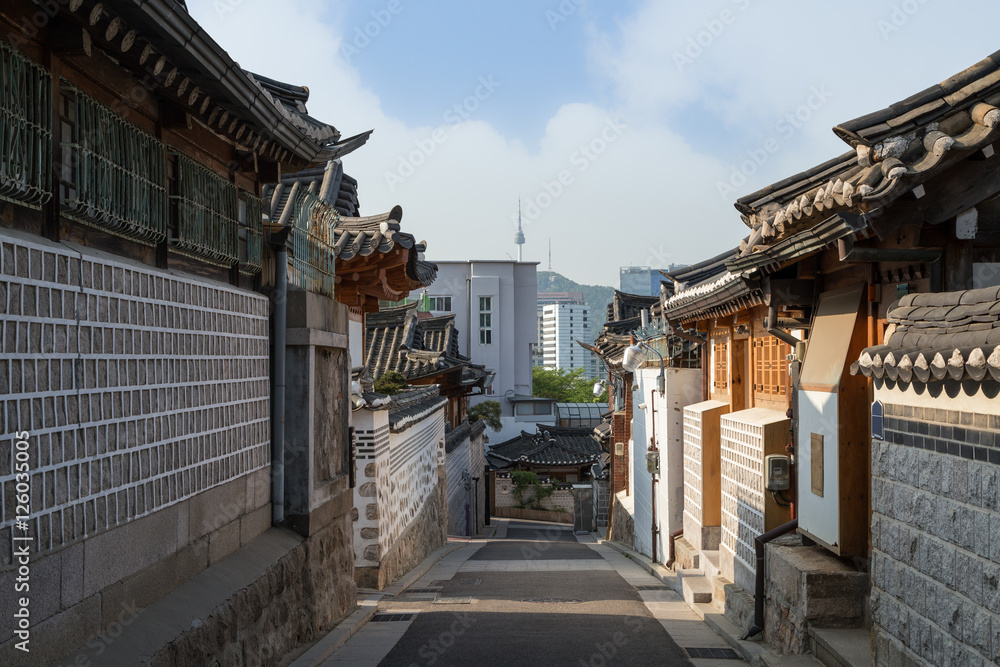Small and empty alley and old buildings at the Bukchon Hanok Village in Seoul, South Korea.