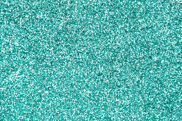 Glittery teal turquoise aqua and mint color glitter sparkle confetti texture background or flyer