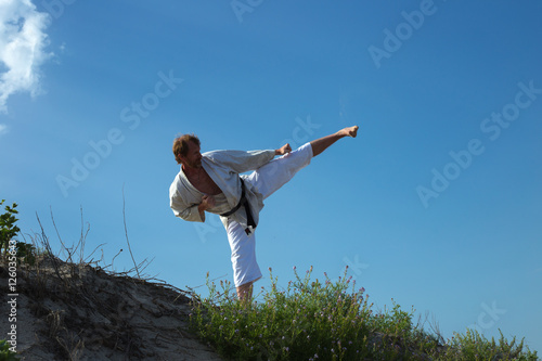 Photos Man practicing a kick