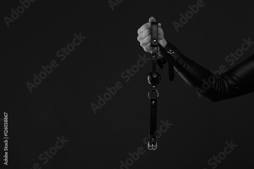woman holds a gag