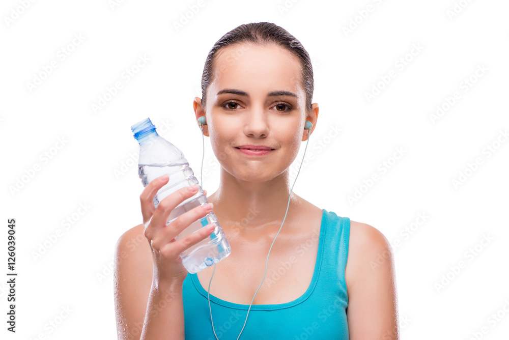 Woman doing sports with bottle of fresh water Woman doing sports with bottle of fresh water