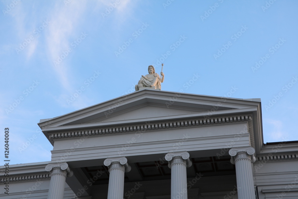 Zeus sculpture on the roof of the Kollegiengebäude in Schwerin, Mecklenburg Vorprommern Germany