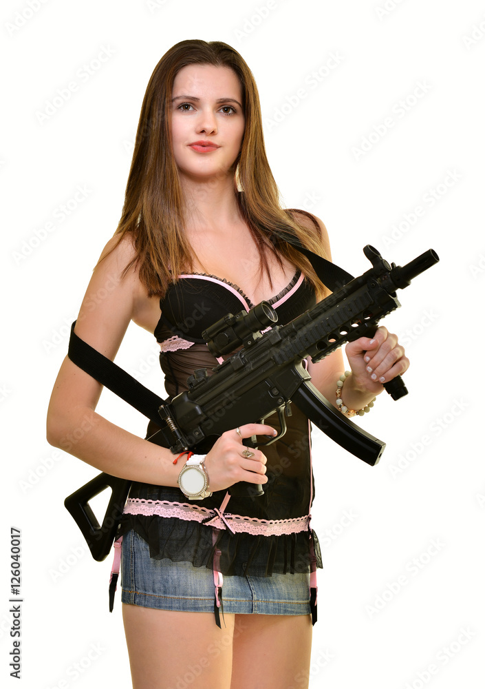 Sexy model woman with a gun