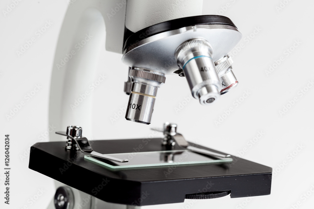 close up macro microscope on white background close up macro microscope on white background
