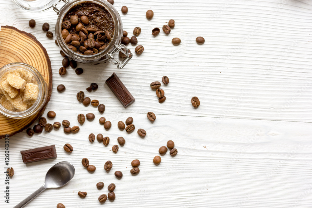 jar coffee-chocolate scrub top view on wooden table jar coffee-chocolate scrub top view on wooden table