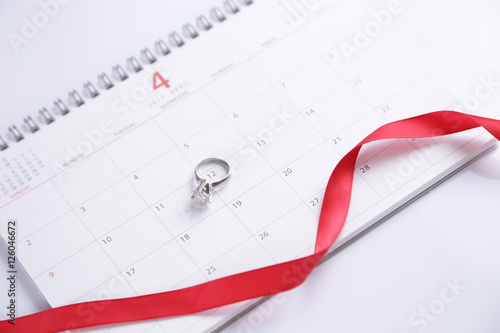 wedding ring and calendar