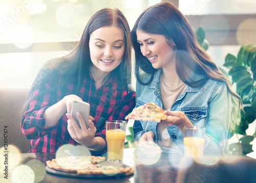 Young women with smartphone...