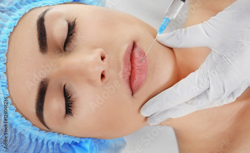Plastic surgery concept. Hyaluronic acid injection