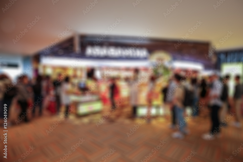 Fototapeta premium Blurred background : Traveler at airport terminal blur backgroun