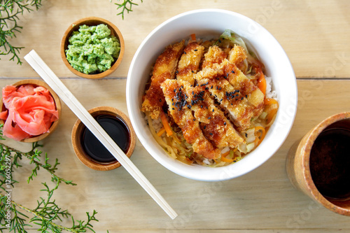 japanese food chicken katsu don served with soy sauce photo