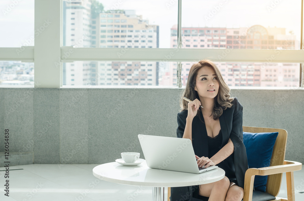 Beautiful businesswoman working at office Beautiful businesswoman working at office