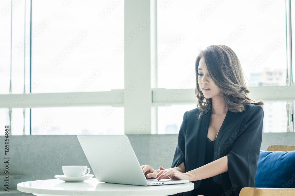 Beautiful businesswoman working at office Beautiful businesswoman working at office