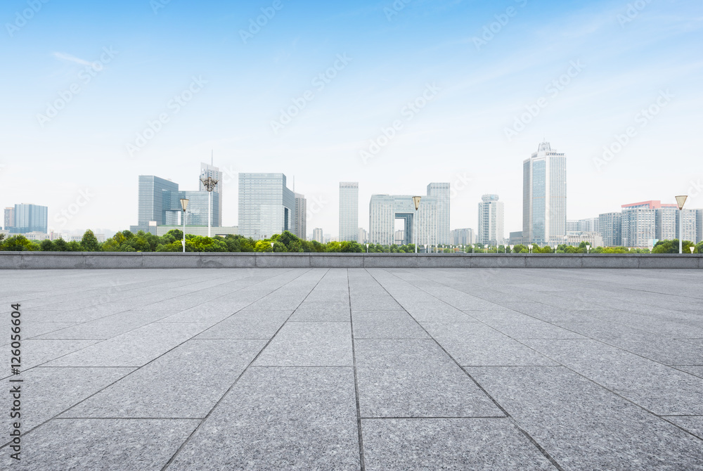 cityscape and skyline of nanjing from empty brick floor