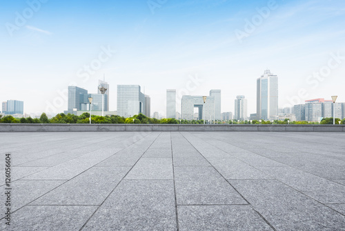 cityscape and skyline of nanjing from empty brick floor