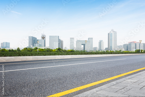 cityscape and skyline of nanjing from empty asphalt road