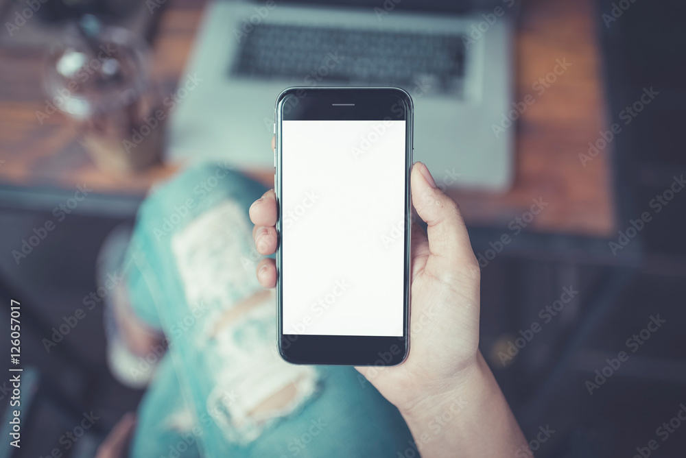 Hand holding smartphone white screen. Hand holding smartphone white screen.