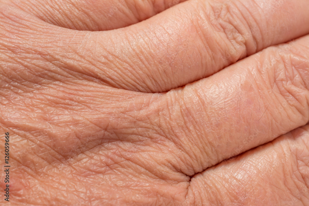 Texture of the skin with wrinkles on the body of mature male Texture of the skin with wrinkles on the body of mature male