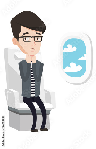 Young man suffering from fear of flying.