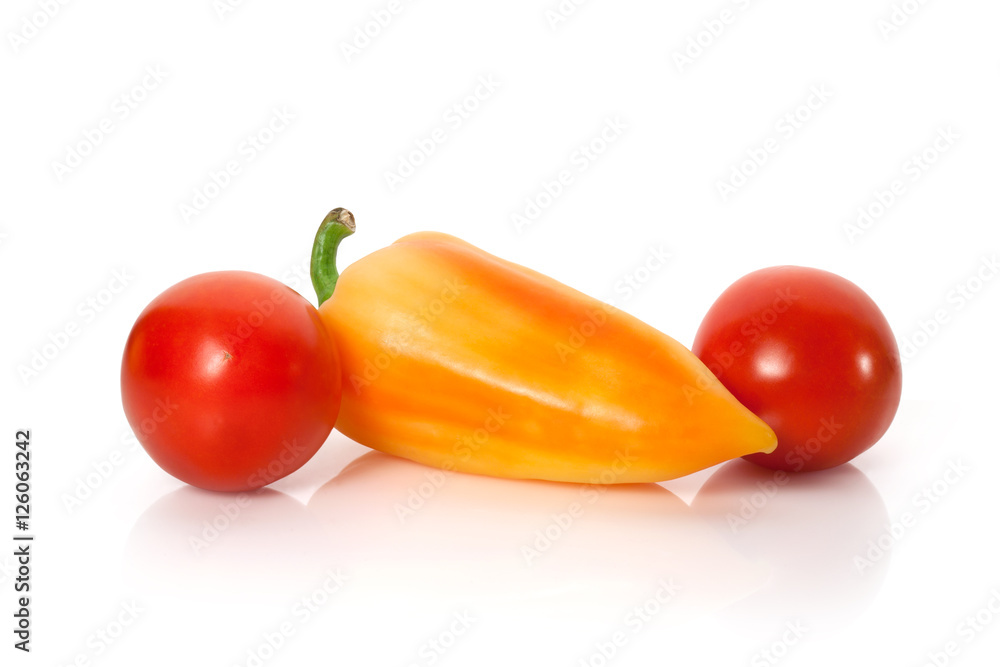 Sweet peppers and tomatoes on white background Sweet peppers and tomatoes on white background