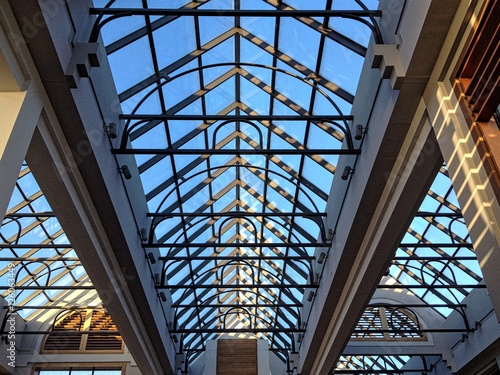 Sunlit glass ceiling of shopping mall building