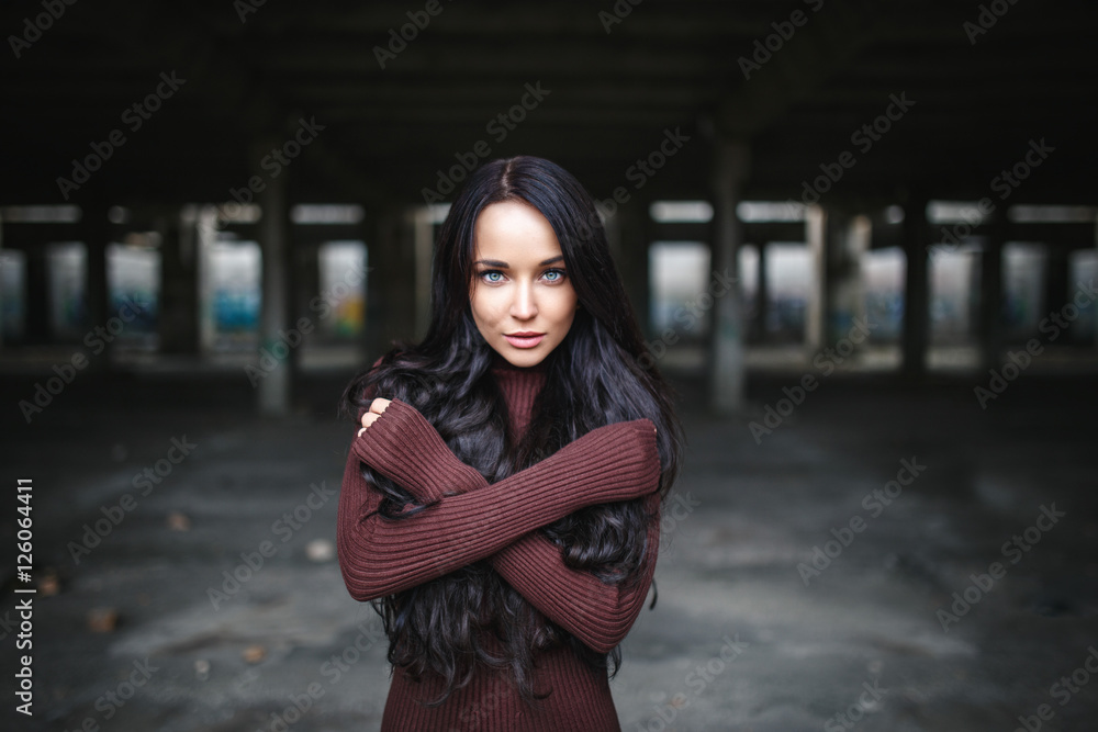 Fototapeta premium portrait of a girl in pullover urban style