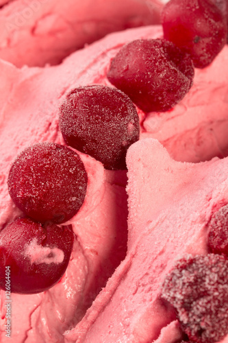 Ice-cream with frozen cherries.