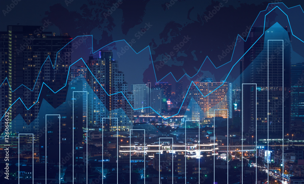 Trading graph on the cityscape at night and world map background