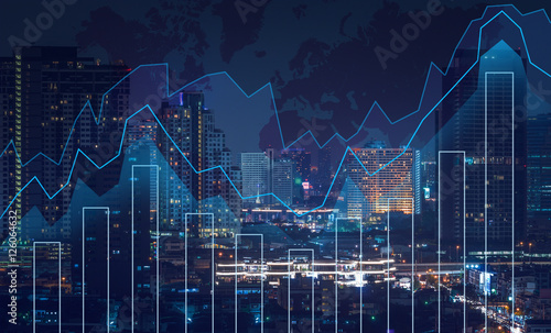 Obraz na płótnie Trading graph on the cityscape at night and world map background w salonie