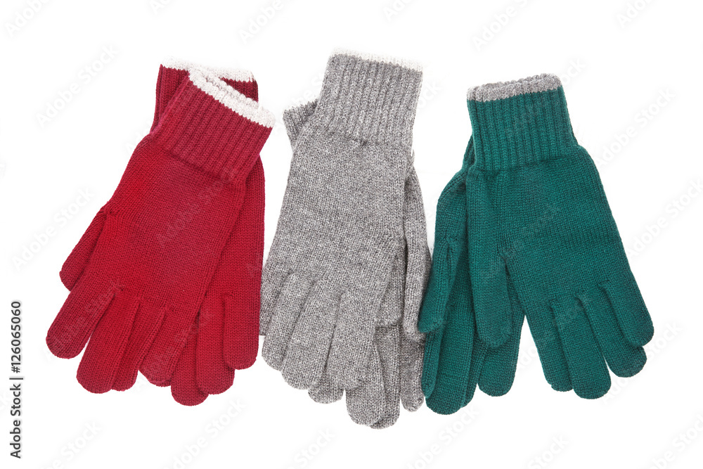 three pairs of knitted gloves
