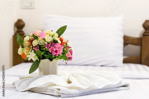 fake flower on bed in the Luxury Interior bedroom © THANANIT