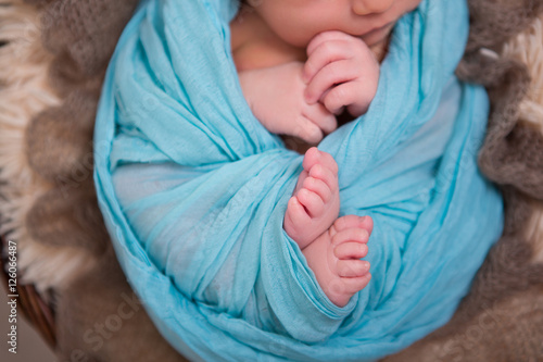 The feet of a newborn baby © renatsadykov