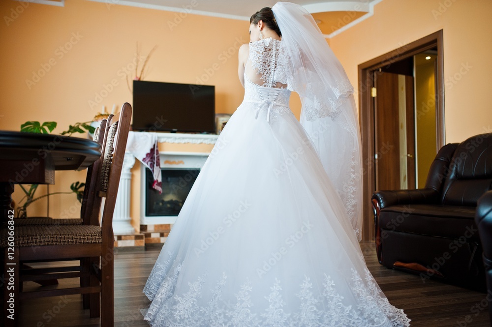 young brunette bride preparation on her room young brunette bride preparation on her room