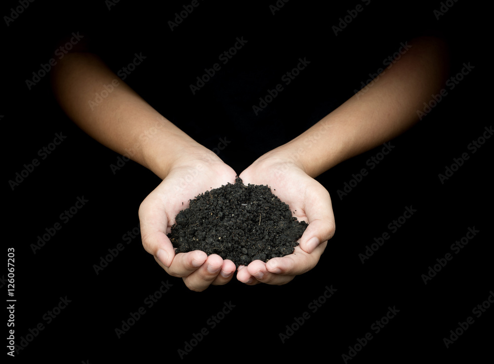 Hands of women holding soil in nature on dark black background 5 Hands of women holding soil in nature on dark black background 5