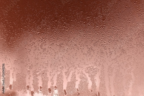 abstract texture of wet glass copper color