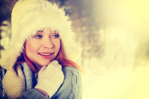 Young woman on the winter background