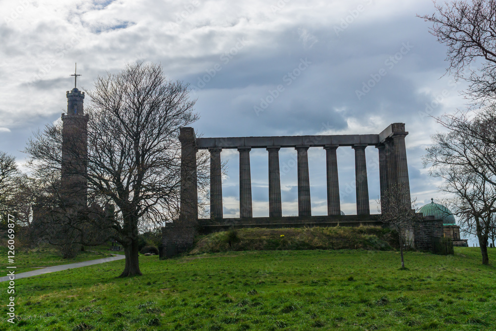 The unfinished National Monument, built to commemorate the soldiers of the Napoleonic Wars and Nelson Monument on Calton Hill, Edinburgh, Scotland, UK.
