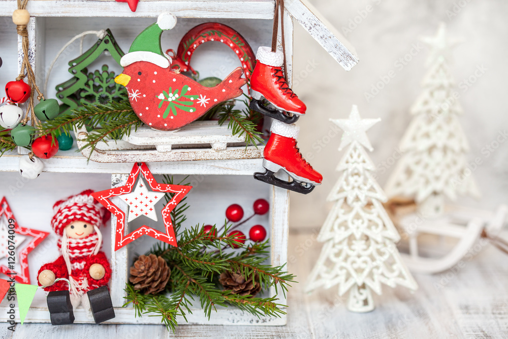 Christmas decoration with wooden house and toys