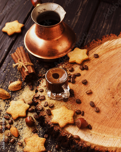 Turkish coffee in a small cup, cookies, selective focus photo