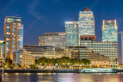 LONDON - SEPTEMBER 25, 2016: Canary Wharf buildings along river