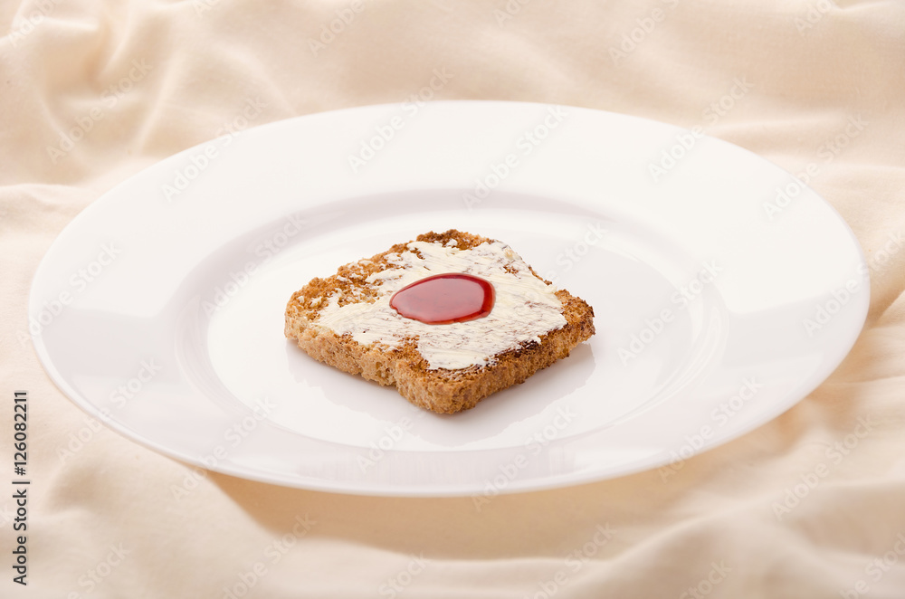 Toast with jam in bed. Good for tea.
