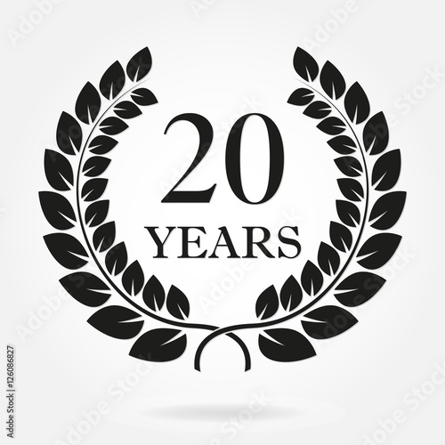 20 years anniversary laurel wreath sign or emblem. Template for celebration and congratulation design. Vector 20th anniversary label isolated on white background.