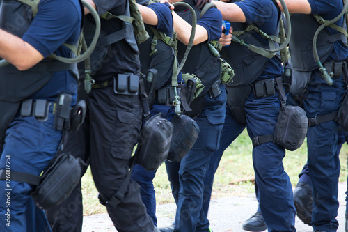 law enforcement training team with tactical equipment and tactic