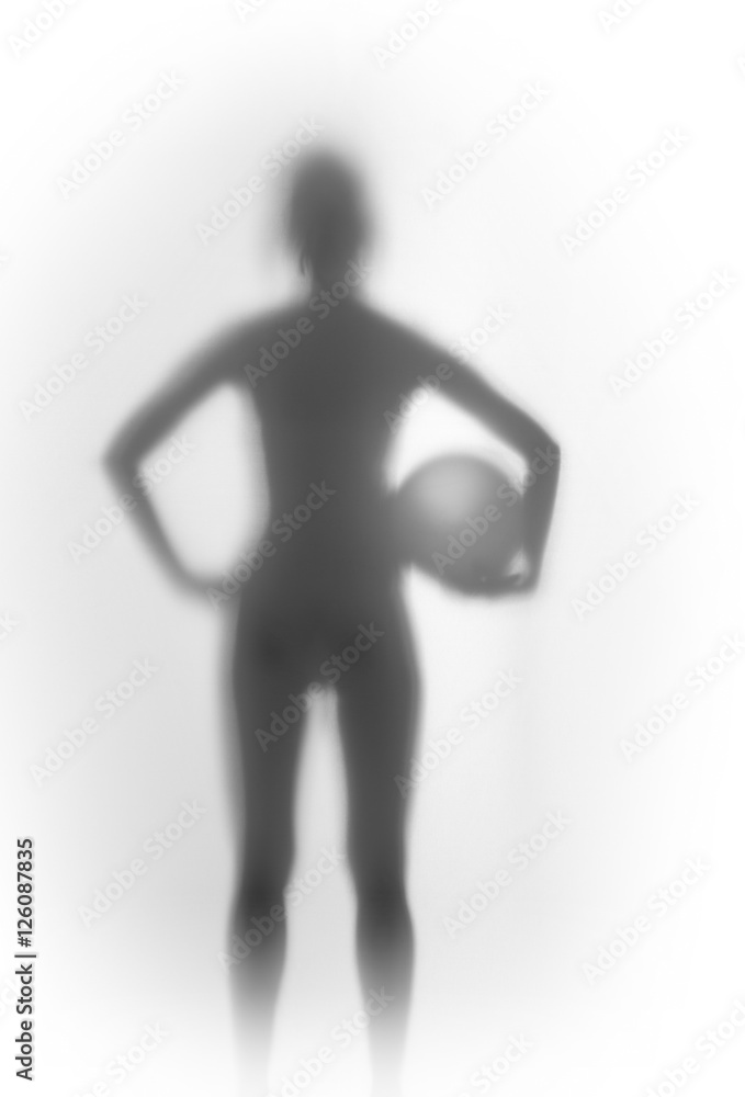 Sexy standing slim woman silhouette with ball Sexy standing slim woman silhouette with ball