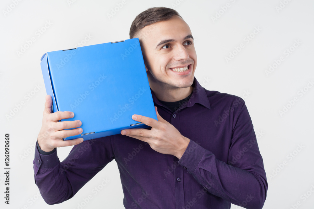Man with a box. Box with a gift in the men hands. Man with a box. Box with a gift in the men hands.