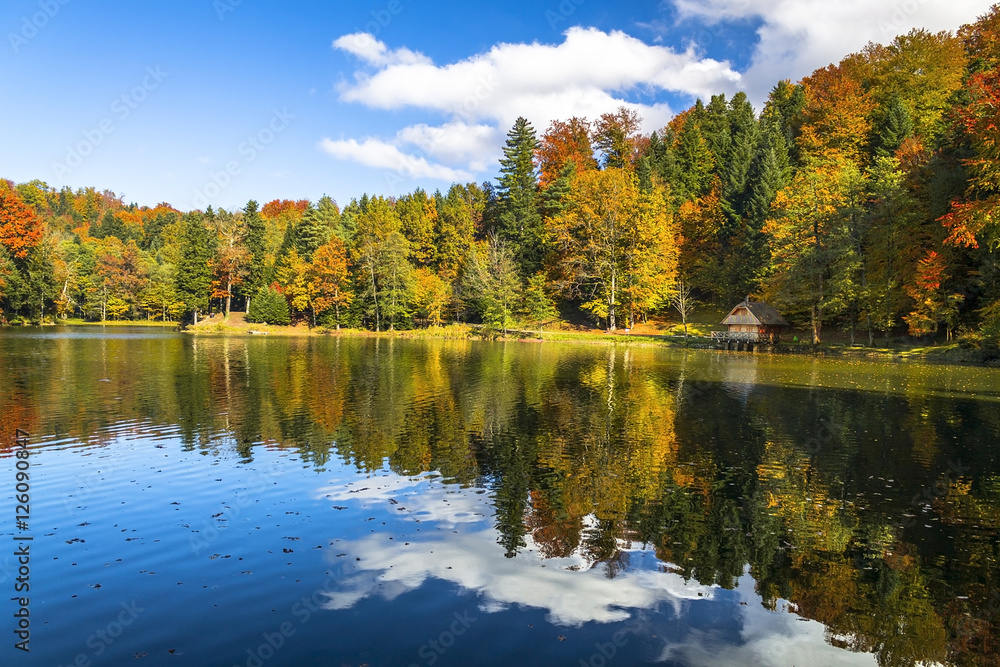 House on a Trakoscan lake in autumn House on a Trakoscan lake in autumn