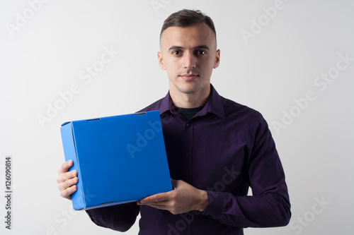 Man with a box. Box with a gift in the men hands.