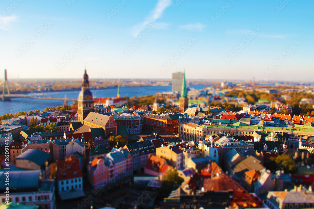 Obraz premium Riga, Latvia - sky view on Old Town from Saint Peter church. tilt shift style