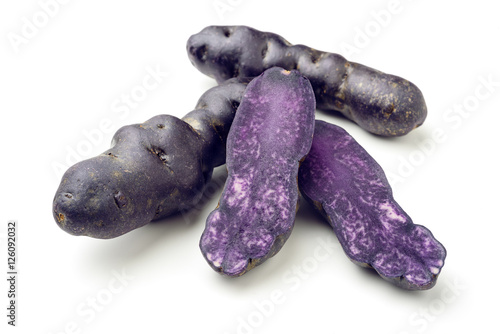 Photos vitelotte potatoes on white